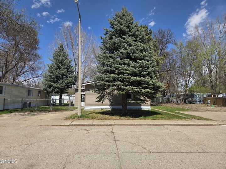 Property Photo:  1119 University Drive 1705  ND 58504 