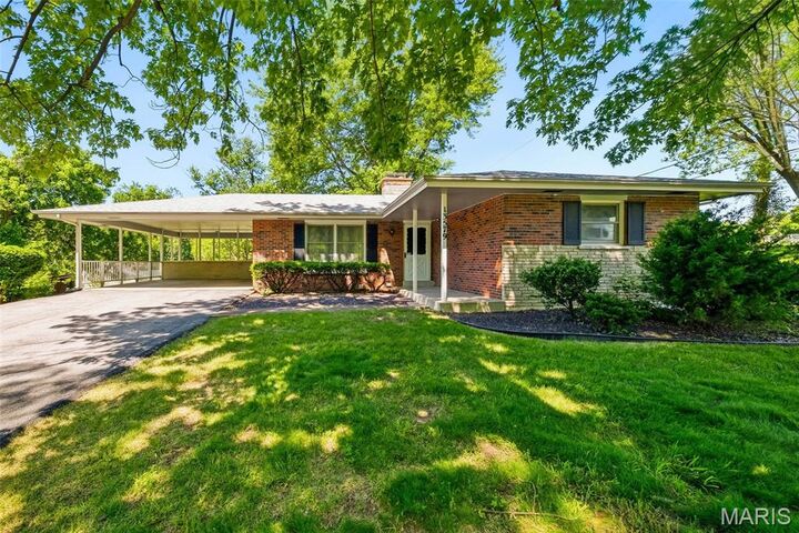 Property Photo:  13579 Old Jamestown Road  MO 63033 