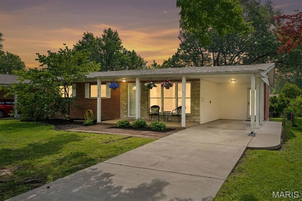 Property Photo:  310 Paul Avenue  MO 63031 