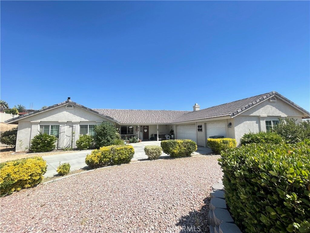 Property Photo:  13997 Riverside  CA 92307 