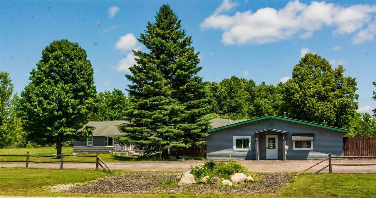 Property Photo: 6990 N U.s. 31 MI 49755