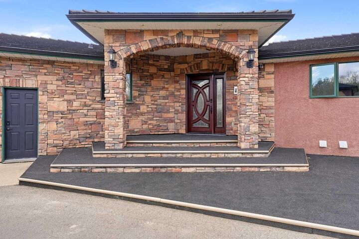 Property Photo: 252072 Township Road 431A AB T4J 1R1