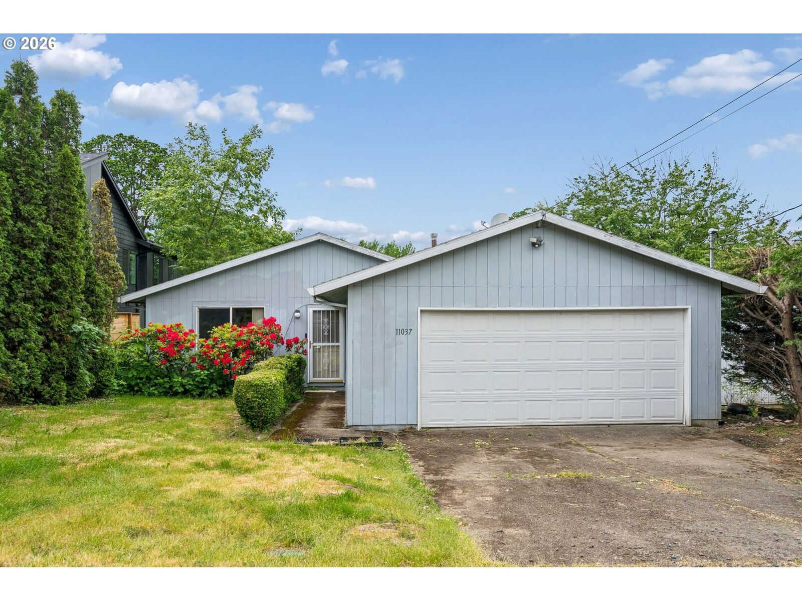 Property Photo:  11037 SW 61st Ave  OR 97219 