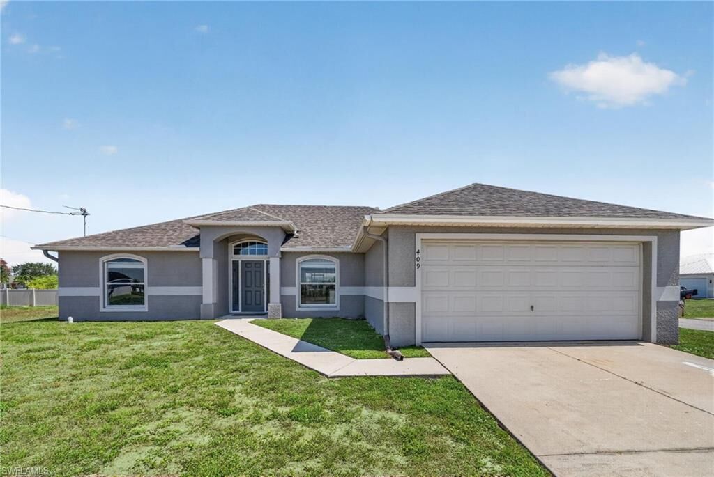 Property Photo: 409 NE 25th Ter FL 33909