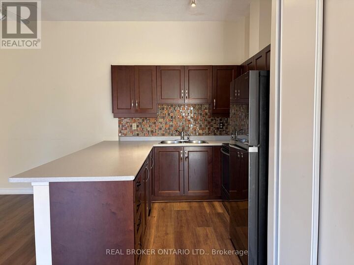 Property Photo: 4140 Foxwood Drive 108 ON L7M 4R4