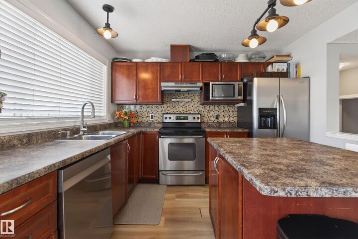 Property Photo:  6054 South Terwillegar Boulevard NW  AB T6R 0K6 