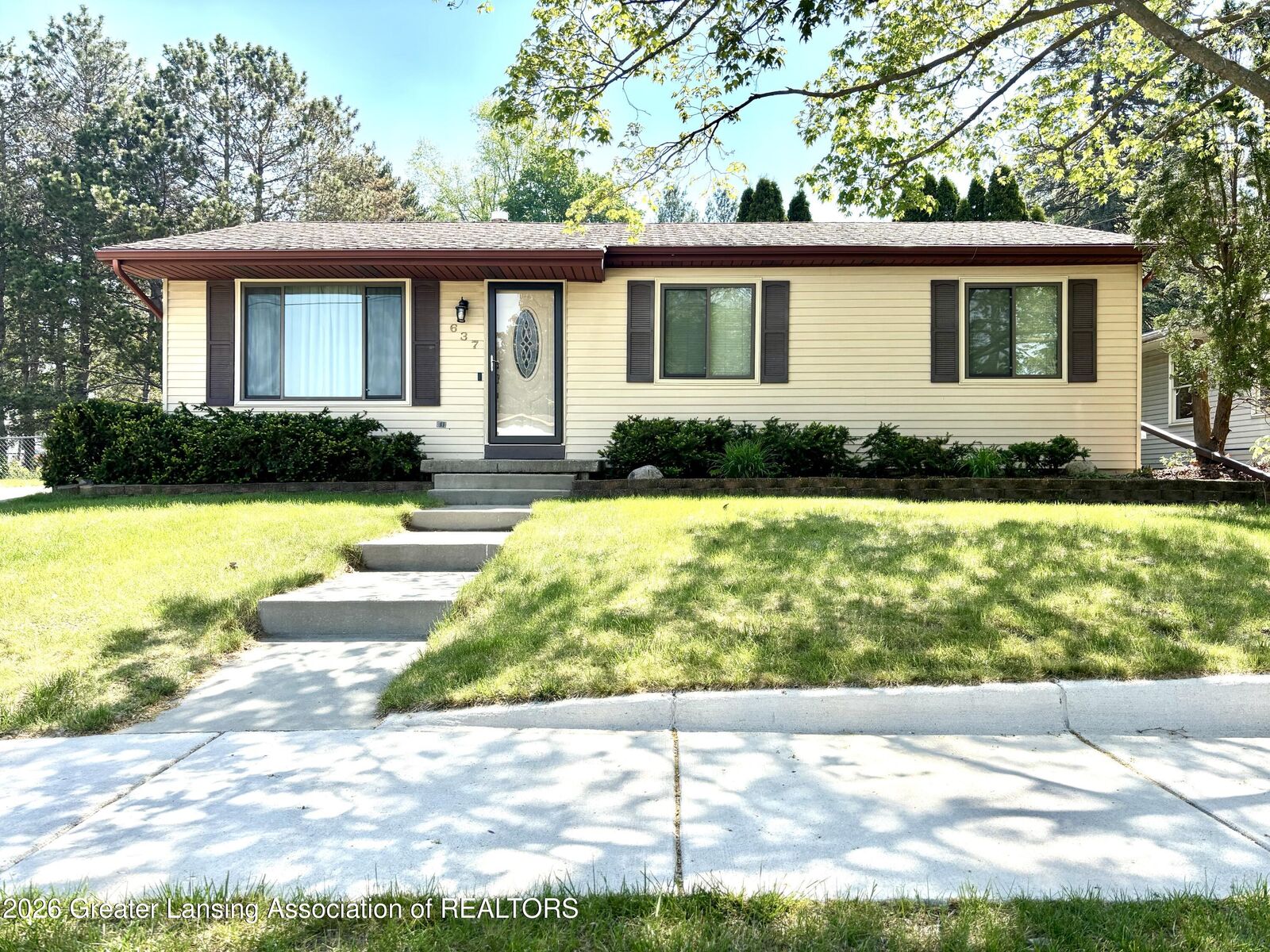Property Photo:  637 Green Street  MI 48837 