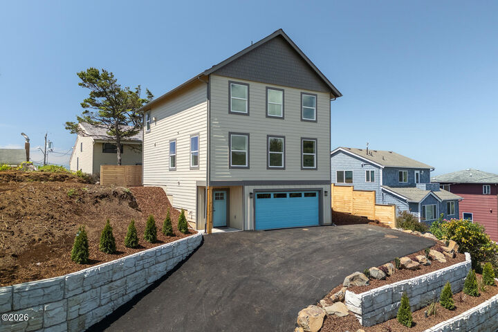 Property Photo:  3619 SW Coast Avenue  OR 97367 