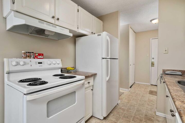 Property Photo:  4501 51 Street 208  AB T9E 5B9 
