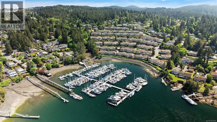 Property Photo:  6880 Wallace Drive 702  BC V8M 1N8 