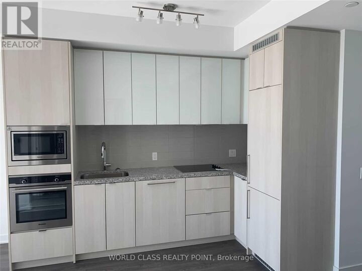 Property Photo: 115 Blue Jays Way 3806 ON M5V 0N4