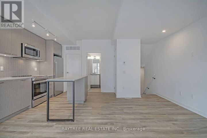 Property Photo:  30 Ed Clark Gardens Th4  ON M6N 0B5 