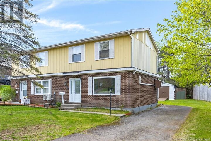 Property Photo: 150 River Hill Drive NB E2M 4T7