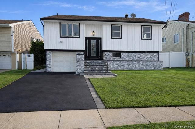 Property Photo: 62 E 1st Street NY 11520