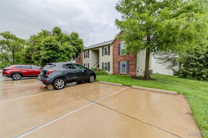 Property Photo:  1504 Surrey Lane C  MO 63304 