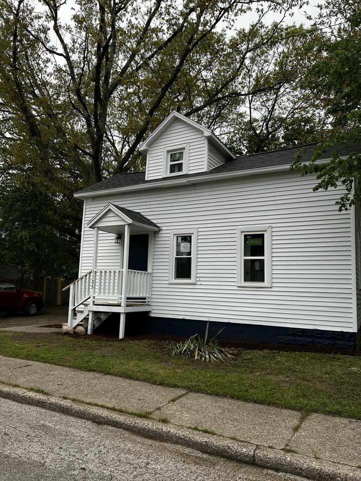 Property Photo:  1135 Holt Street  MI 49442 