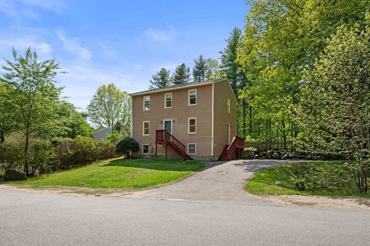 Property Photo: 80 Woodlands Drive NH 03042
