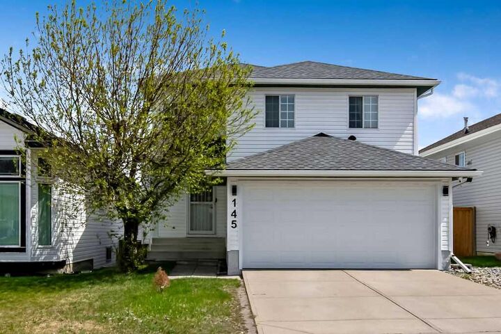 Property Photo:  145 Harvest Glen Way NE  AB T3K 4J4 