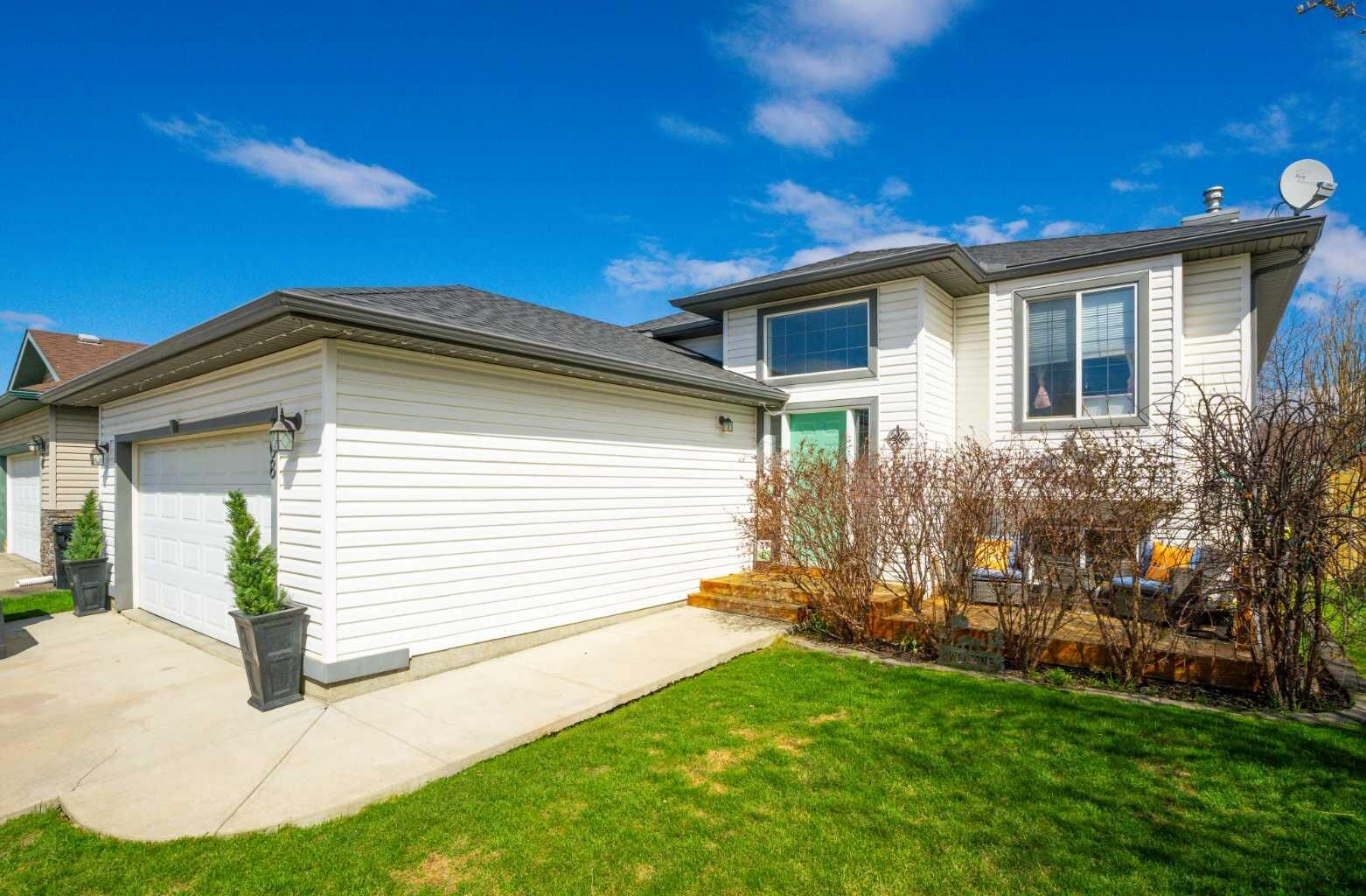 Property Photo:  308 Carriage Lane Drive  AB T0M 0N0 