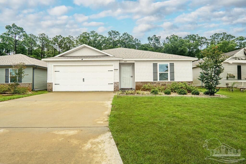 Property Photo: 6469 June Bug Dr FL 32583