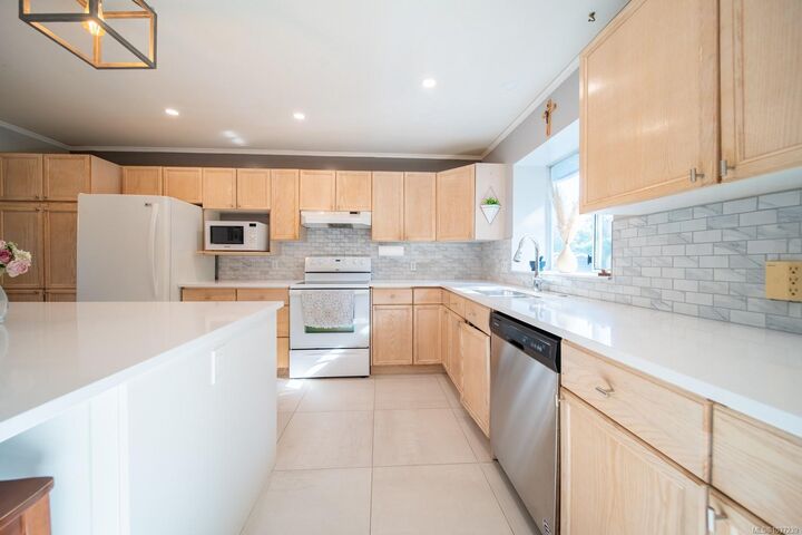 Property Photo:  5668 Rutherford Rd  BC V9T 6R2 