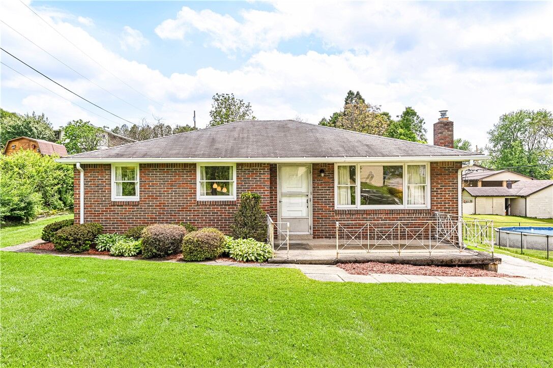 Property Photo:  13740 Ridge Rd  PA 15642 