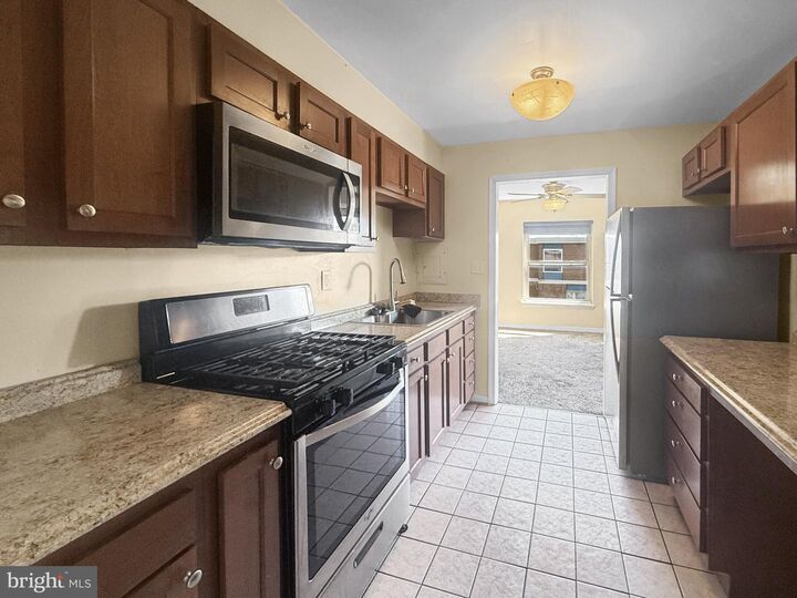 Property Photo: 3807 Saint Barnabas Road 203 MD 20746