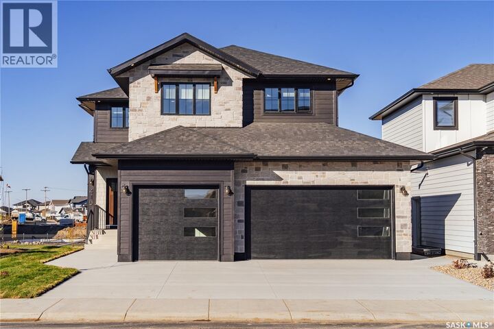 Property Photo:  415 Sharma Crescent  SK S7W 1K8 