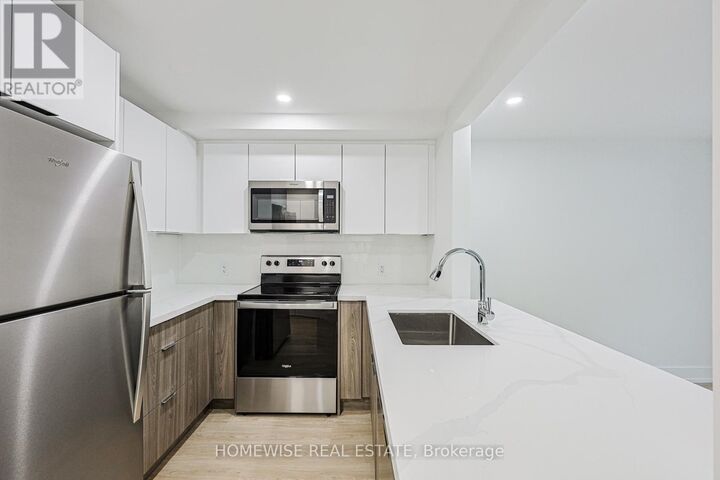 Property Photo:  100 Liberty Street North 18A  ON L1C 2M1 