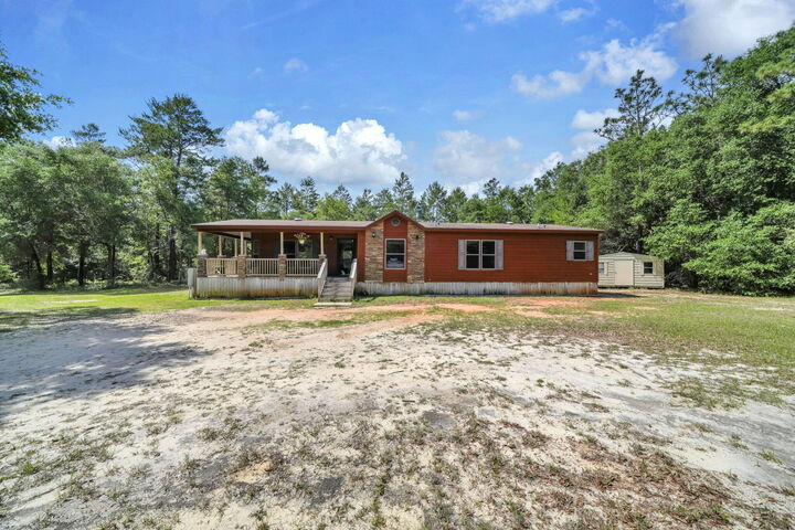 Property Photo: 5561 Highway 393 FL 32539