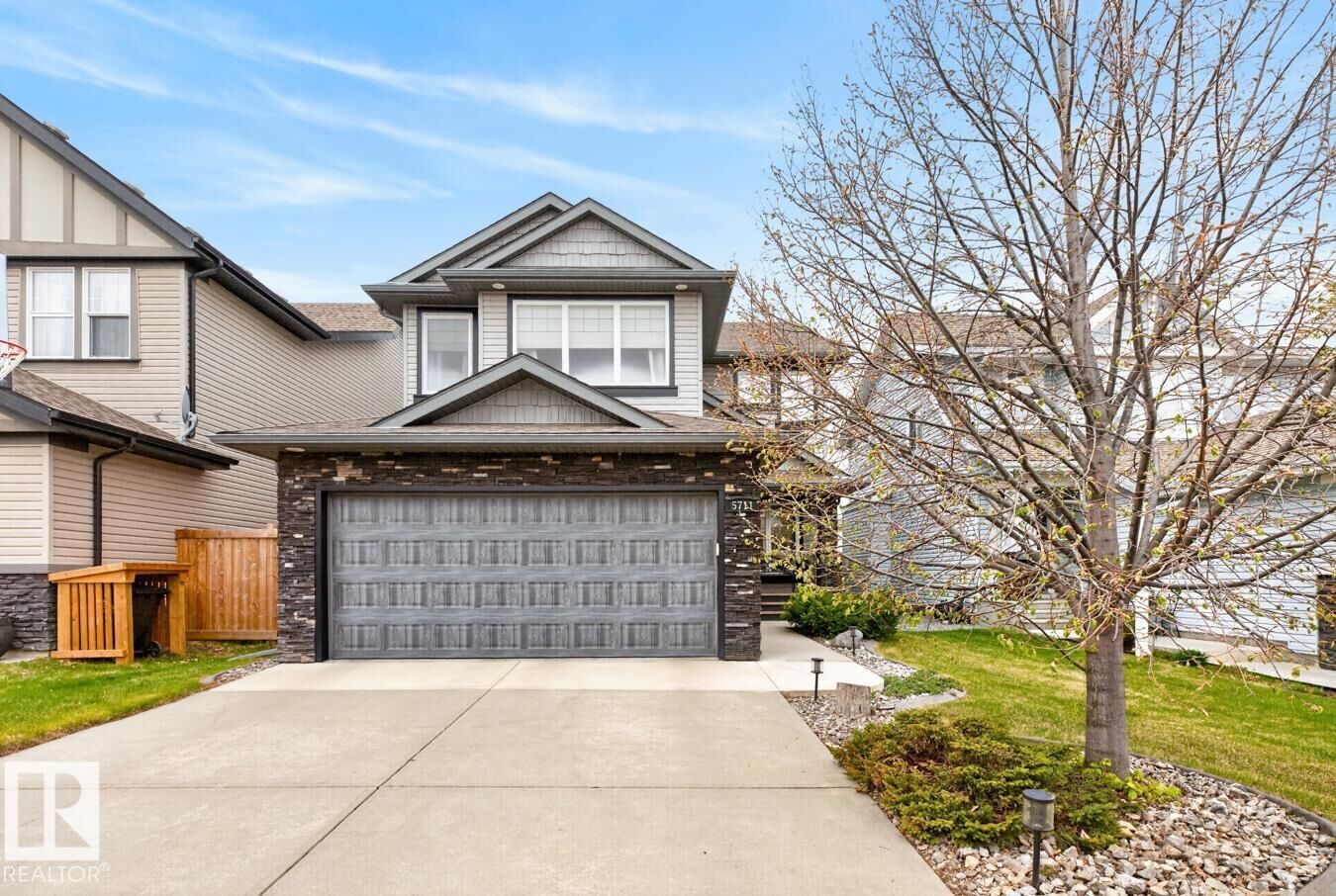 Property Photo:  5711 Sunview Point(E)  AB T8H 0J9 
