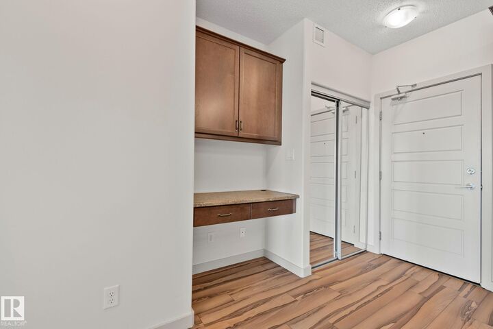 Property Photo:  320 Ambleside Link SW 218  AB T6W 2Z9 