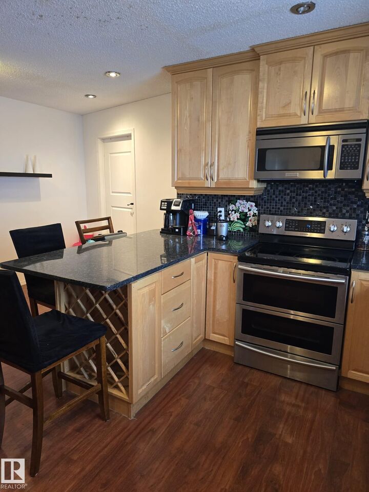 Property Photo: 11927 85 Street NW AB T5B 3G2