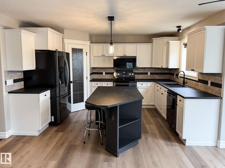 Property Photo: 32 Carriere Crescent AB T4X 0A8