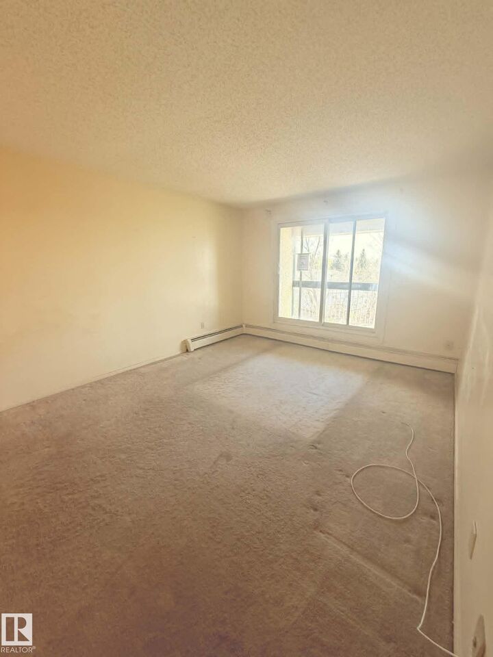 Property Photo:  4810 Mill Woods Road NW 414  AB T6L 5N9 
