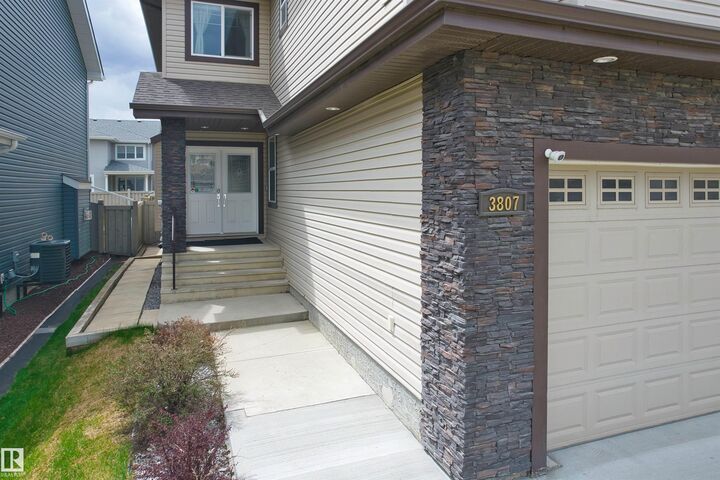 Property Photo: 3807 Claxton Close SW AB T6W 1Y5