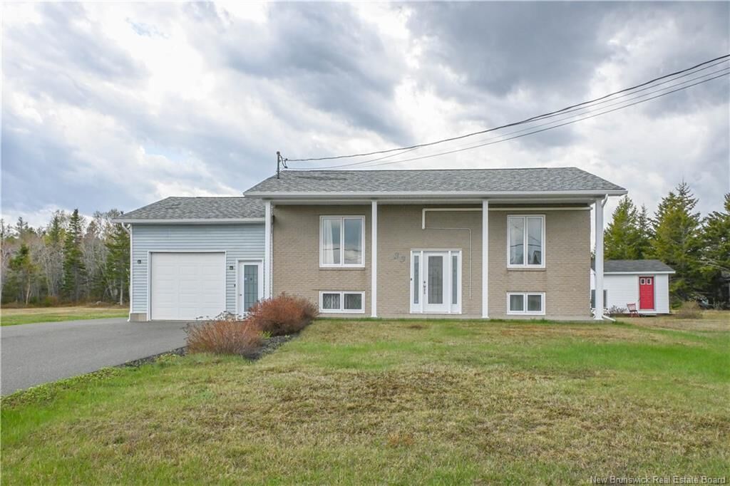Property Photo: 33 De La Baie Street NB E8N 2A9