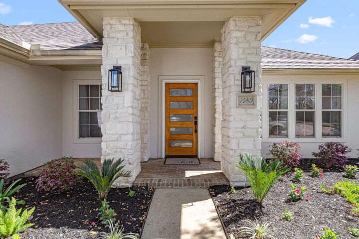 Property Photo: 1489 Garden Lakes Drive TX 77546