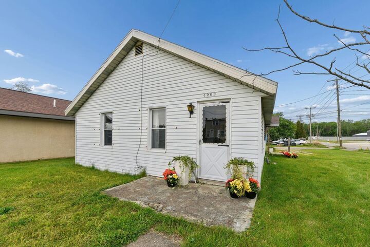Property Photo:  4209 Post Court  MI 49106 