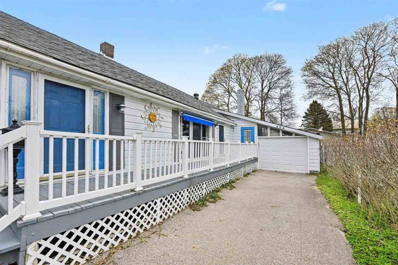 Property Photo:  404 May  MI 49720 