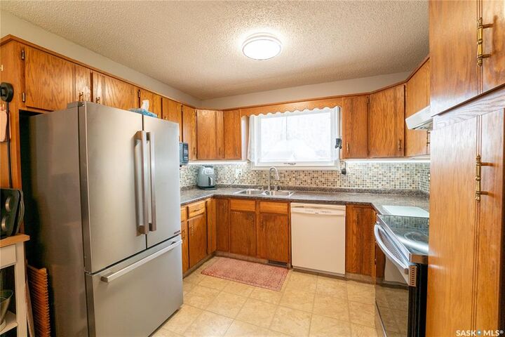 Property Photo:  406 Walter Scott Avenue  SK S0G 2E0 