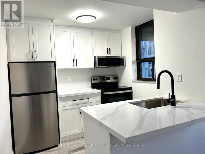 Property Photo: 53 McCaul Street 641 ON M5T 2W9