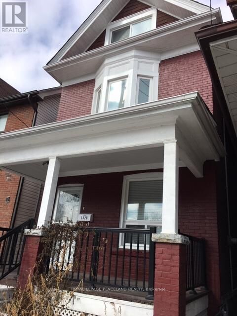 Property Photo:  1320 Dundas Street Main+Bs  ON M4M 1S6 