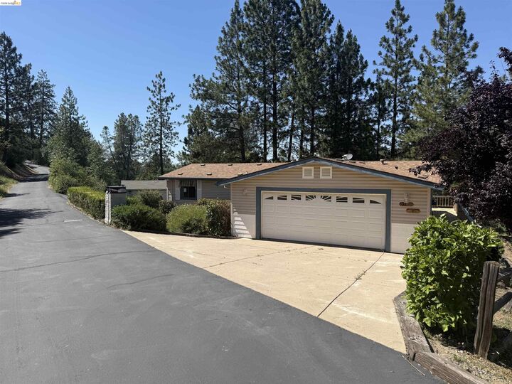 Property Photo: 22700 Hidden Hollow Dr CA 95321