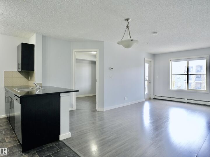 Property Photo: 5816 Mullen Place NW 320 AB T6R 0W3