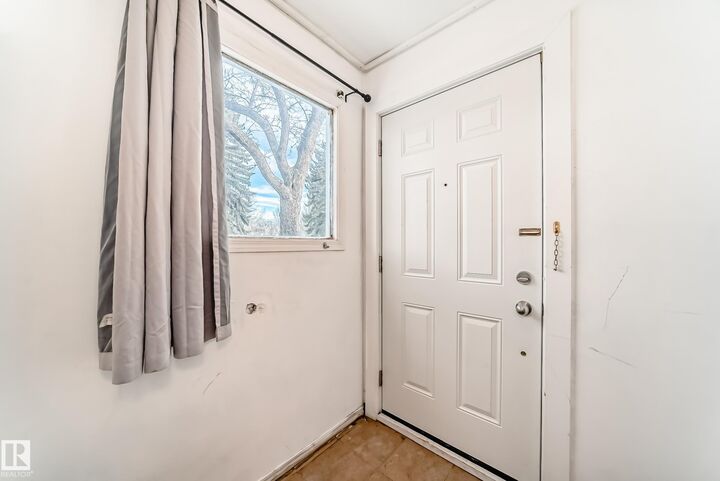 Property Photo: 10564 92 Street NW AB T5H 1T9