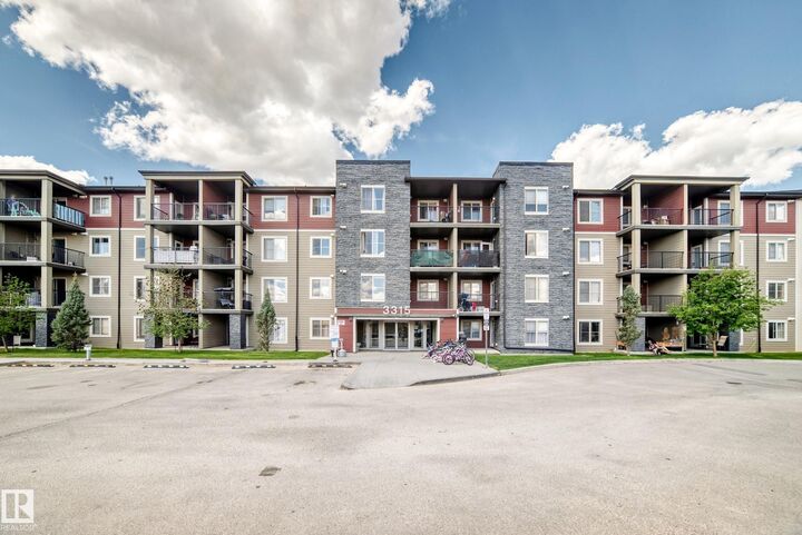 Property Photo: 3315 James Mowatt Trail SW 210 AB T6W 3L9
