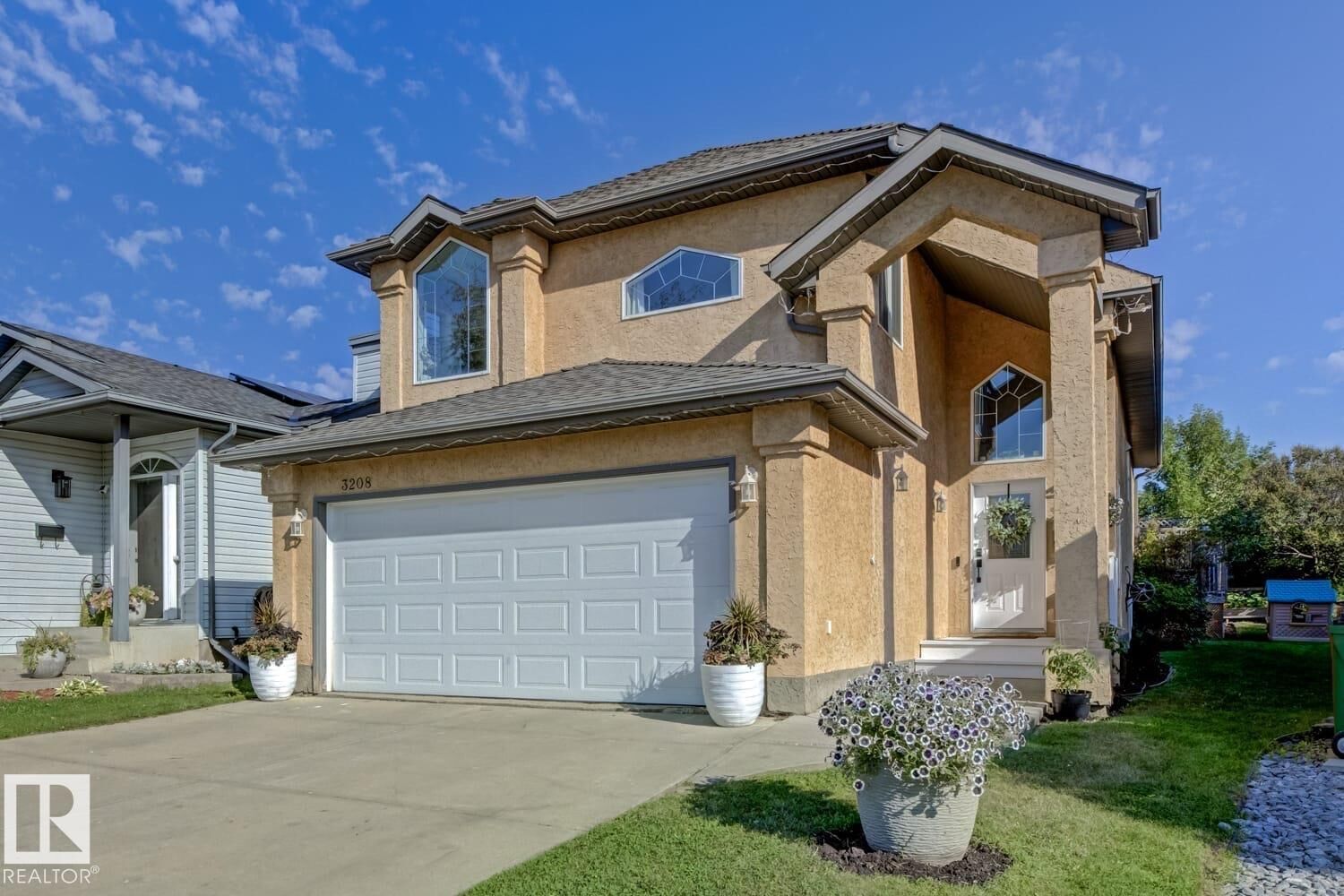 Property Photo:  3208 135A Avenue NW  AB T5A 5E3 