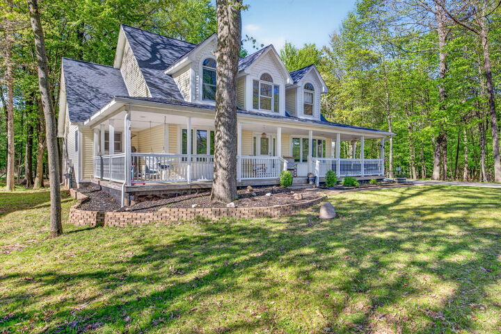 Property Photo:  6908 Club House Drive E  MI 49346 