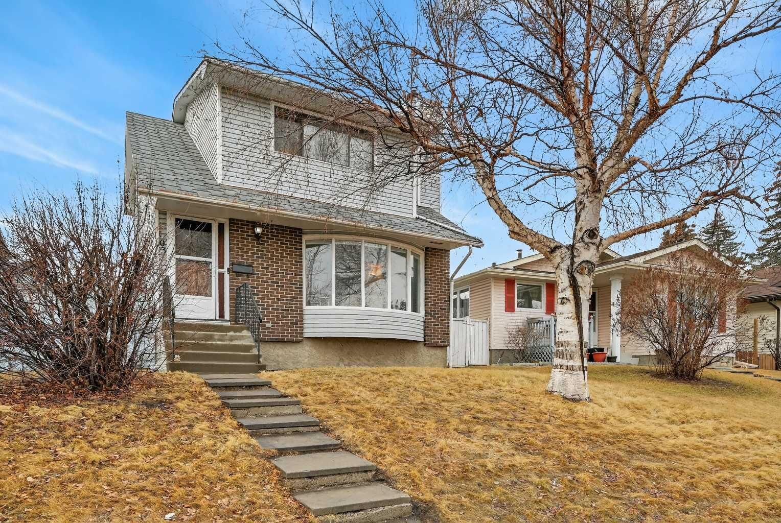 Property Photo: 103 Macewan Drive NW AB T3K 2G2